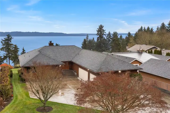 Sweeping views of Puget Sound highlight this one-owner custom built home sitting on 1/2+ acre lot.