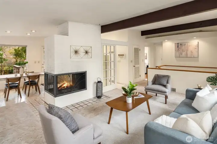 Double-Sided Fireplace Can be Enjoyed from Living Room and Dining Room