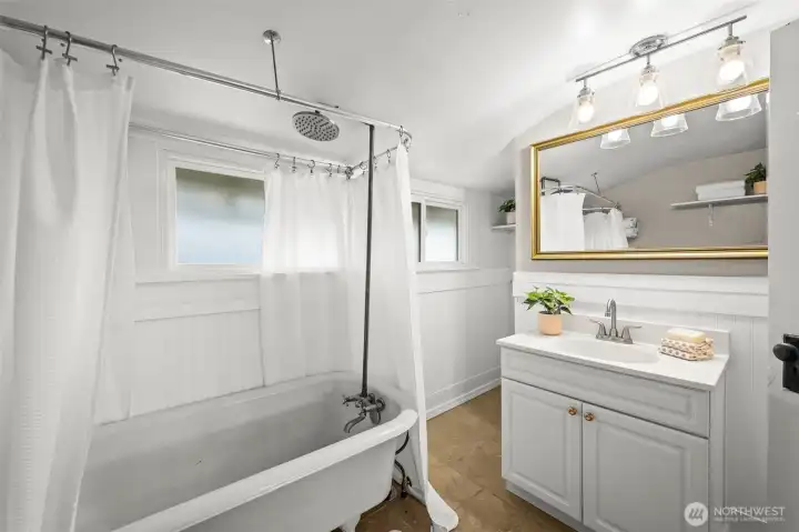 Upstairs full bath with original clawfoot teb