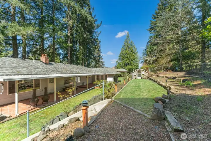 Terraced Backyard with Green House