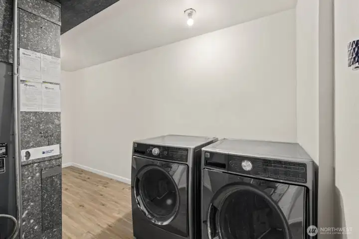 Downstairs Utility Room with furnace and laundry