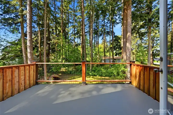 Private deck off of the upstairs primary suite
