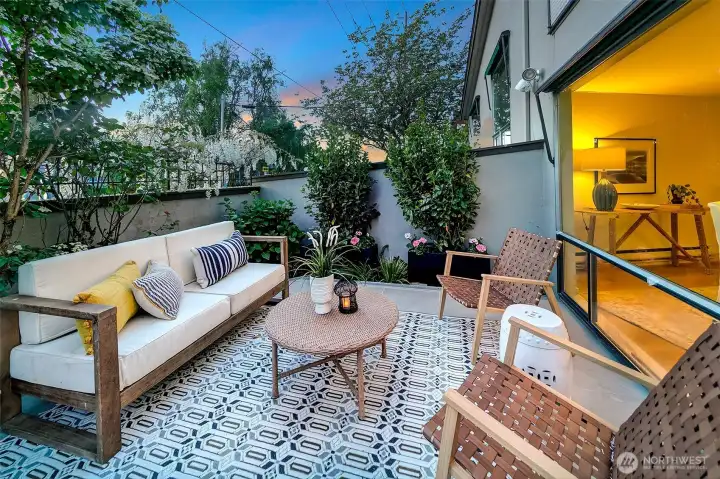 However, your guests may park in the lot below and enter through your expansive 500' plus patio which stretches the width of the home.