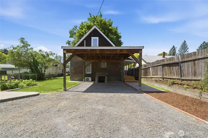 Oversized 2-car Carport in the back of the home