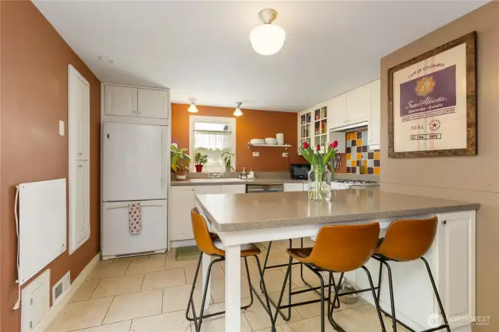 Your kitchen has built-in eating space, plenty of storage, and a gas range.