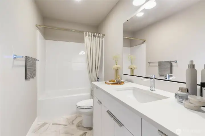 Not subject property. Virtually staged like unit. One of three bathrooms in this home