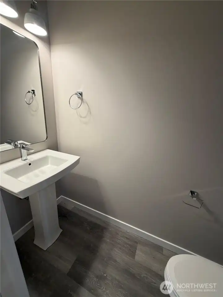 Subject property. Powder room privately tucked away