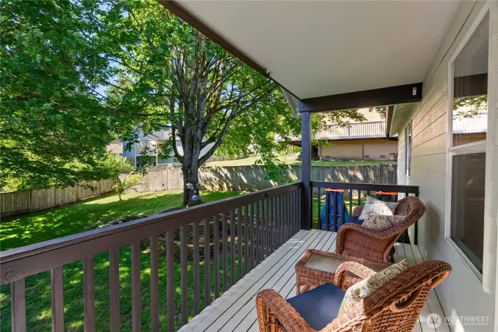 Back deck off living room. Back deck off living room.