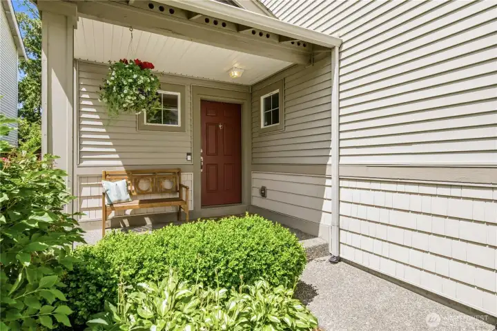 Covered front porch with room for sitting. Covered front porch with room for sitting.