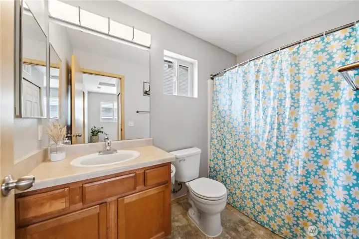 Upstairs shared full bathroom. Upstairs shared full bathroom.