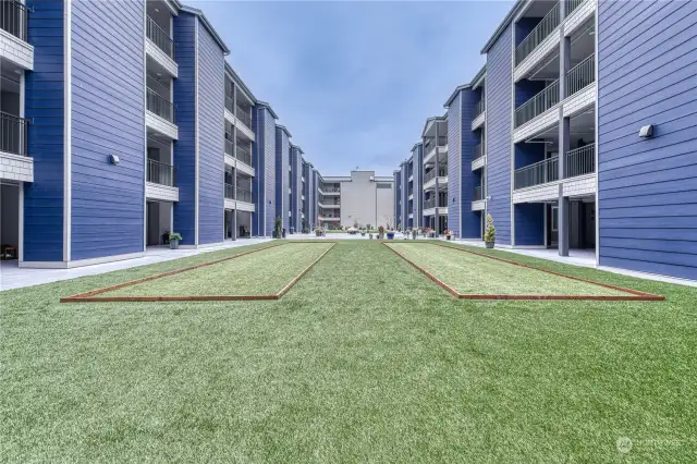 Common area with bocce and putting green.