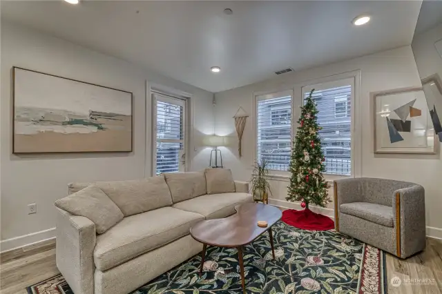 Newer luxury vinyl flooring with plantation shutters are just some of the upgrades in this beautiful unit.