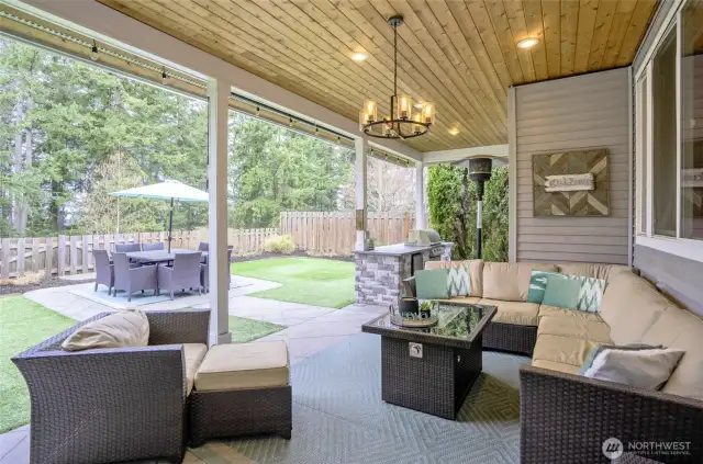 Enjoy entertaining in your backyard w/covered patio & built in stone bbq!