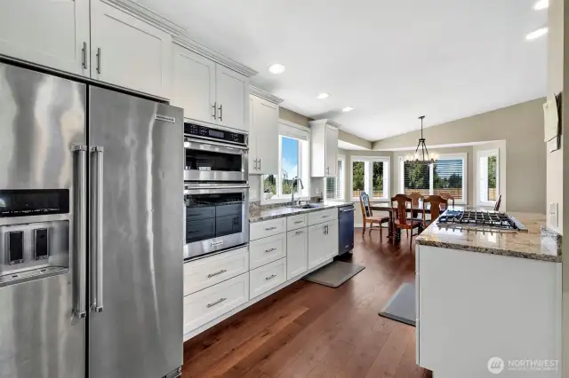 Quartz counters with white shaker cabinets