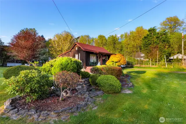 Nicely landscaped garden area, complete with pond!