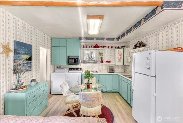 Imagine making and enjoying meals in this cute kitchen!