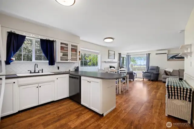 Open main floor layout makes it easy to connect from kitchen to dining, living, and bonus rooms.