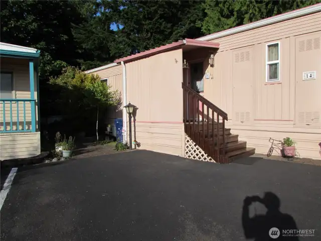 BACK DOOR ENTRY OFF PARKING AREA. FRONT OF HOME IS ON LAKE VIEW SIDE OF HOME.