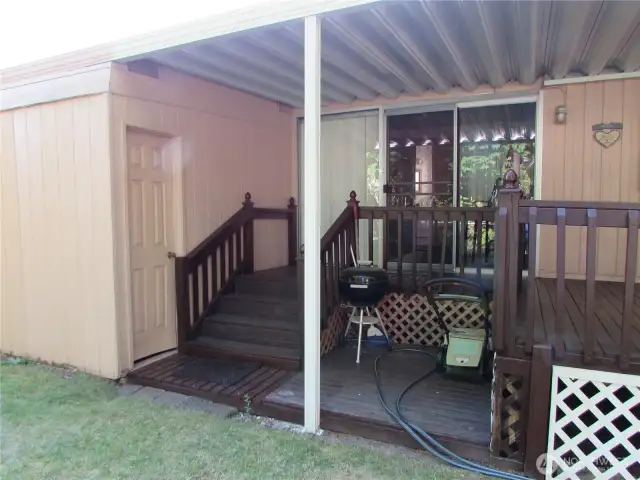 SMALL SHOP ENTRY TO LEFT, COVERED STORAGE AREA.