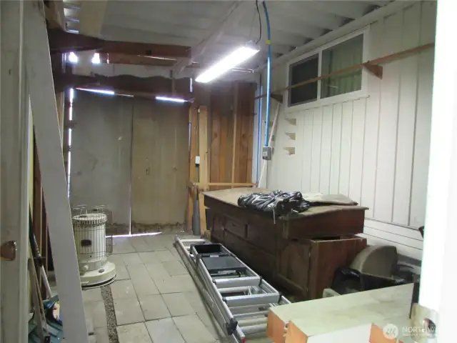 INSIDE SMALL SHOP, SPACIOUS AND HAS POWER.