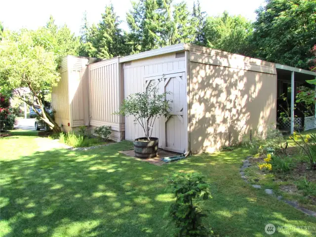 SOUTH END OF HOME WITH DOUBLE DOORS TO SHOP..