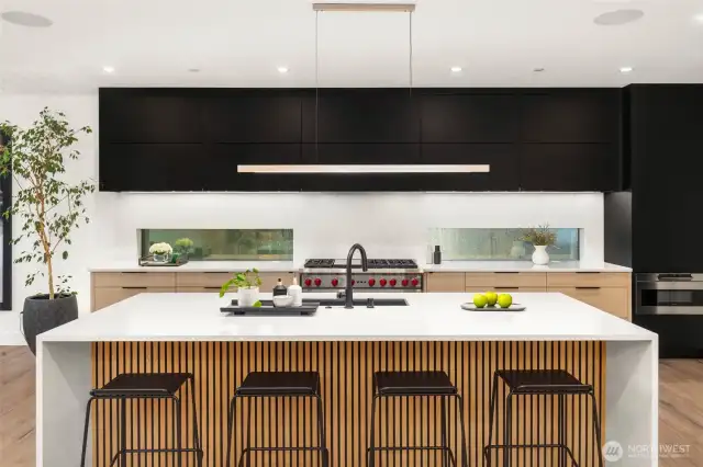 The gourmet kitchen is outfitted with Wolf and Sub-Zero appliances.