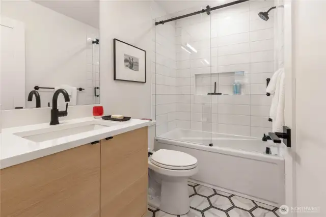 3rd full bath on lower level.