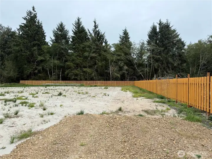 Privacy fence on south and east sides