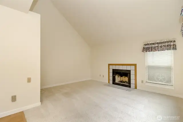 sunny family room with slider to back yard