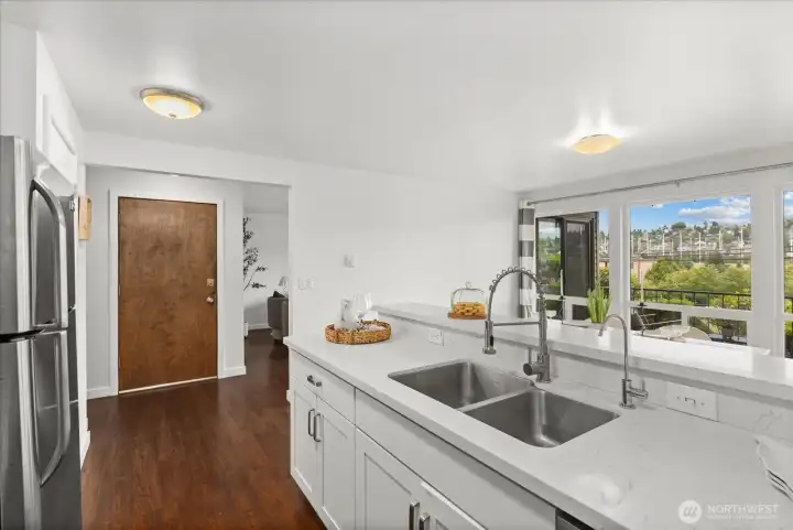 Kitchen with views of Queen Anne and Interbay Golf Course.