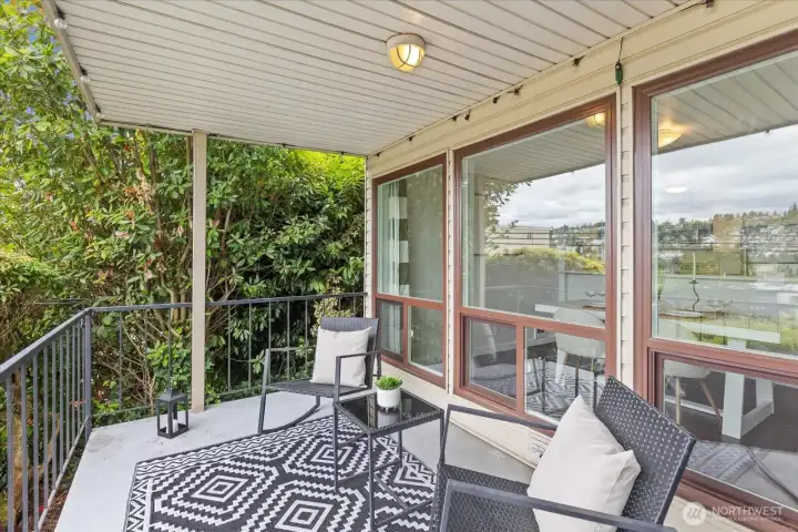 End unit with strategically placed plant life to ensure privacy.