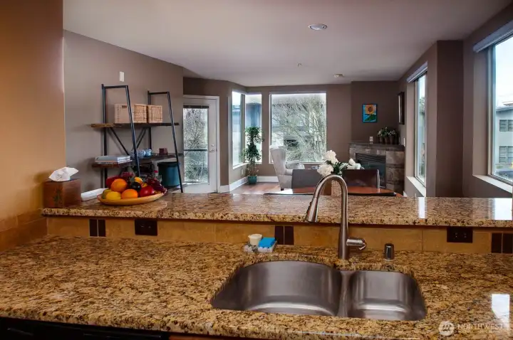 Kitchen is open to spacious Great Room and enjoys views and sunshine from the many windows.