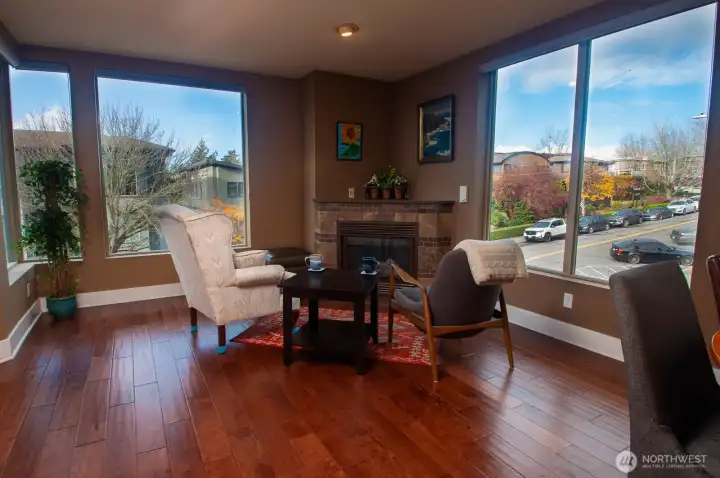 Corner gas fireplace provides cozy, welcome warmth on chilly days and evenings.