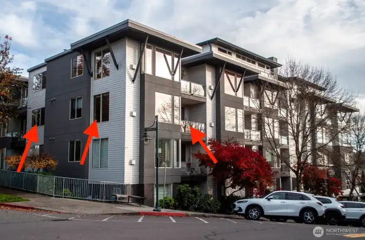 Red arrows show location of #306 on the northwest corner of the building.