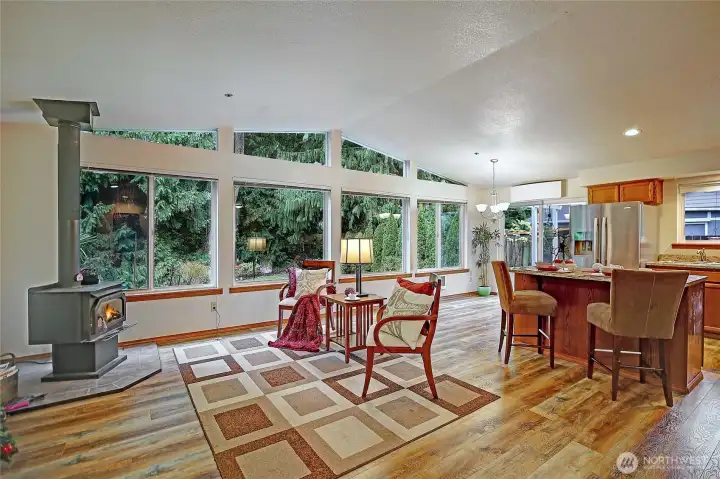 Vaulted open concept Great room. Faces your private forest view.