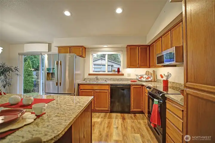 Loads of cabinet storage and granite working counter space