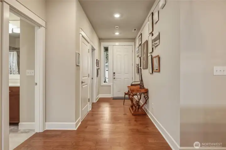 Looking back to the front door- shared bath to the left- front bedroom on the left- Den/Office to the right.