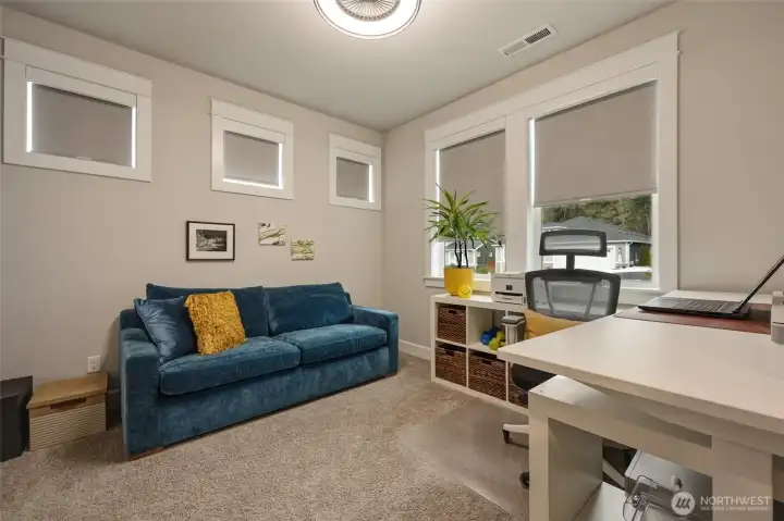 Second bedroom is currently used as an office. Blinds installed throughout the home.