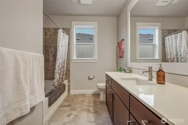 Shared bath close to the Second bedroom & Utility room
