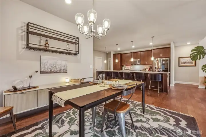 Dining area defined by the sliding glass door to the backyard