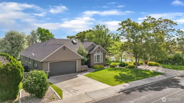 Covered front entry with welcoming curb appeal and extra off-street parking Covered front entry with welcoming curb appeal and extra off-street parking