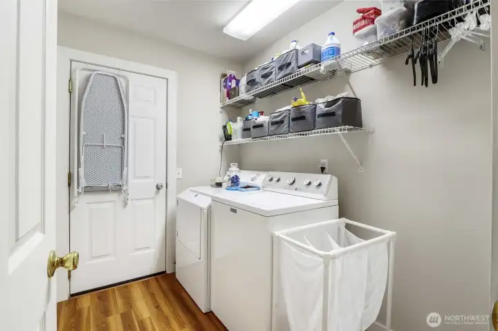 Laundry and utility area with functional storage and workspace Laundry and utility area with functional storage and workspace