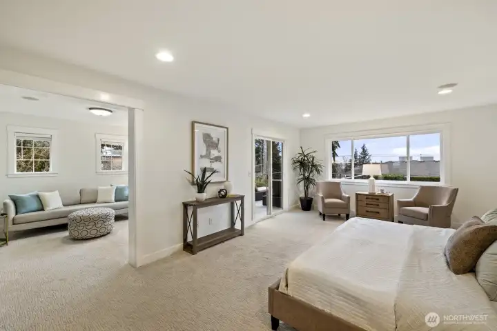 Head upstairs to your luxe primary retreat, complete with a sitting area, a private view deck, a spa-like ensuite bath and a walk-in closet.