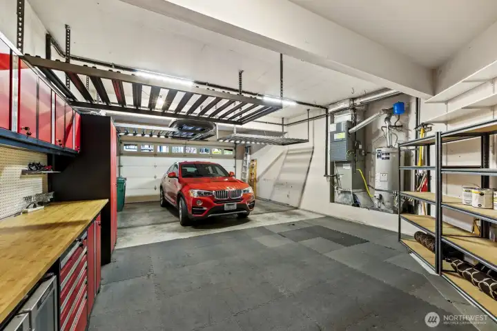 The large garage has space to park two cars, as well as store outdoor gear, lawn tools, or whatever else you need.