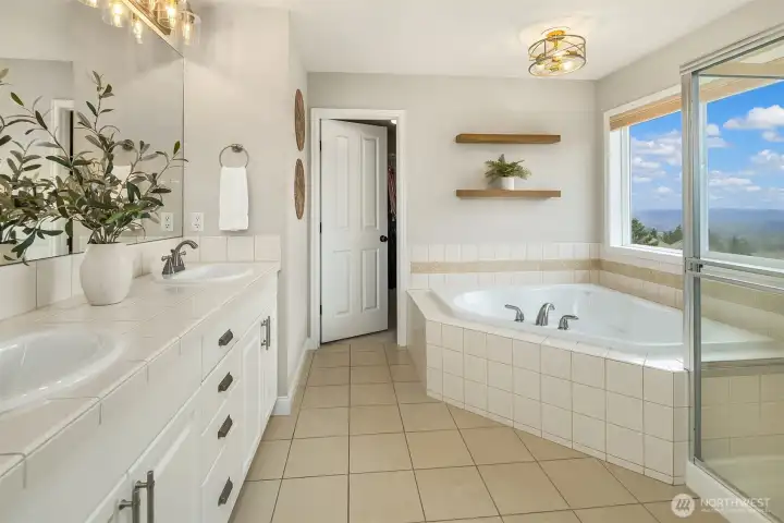 Huge WIC through Primary Bath with soaking tub and views!
