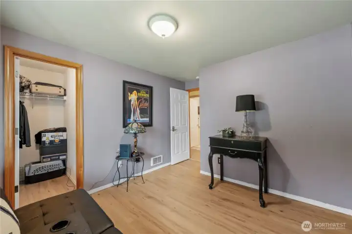 Spare bedroom with walk-in closet