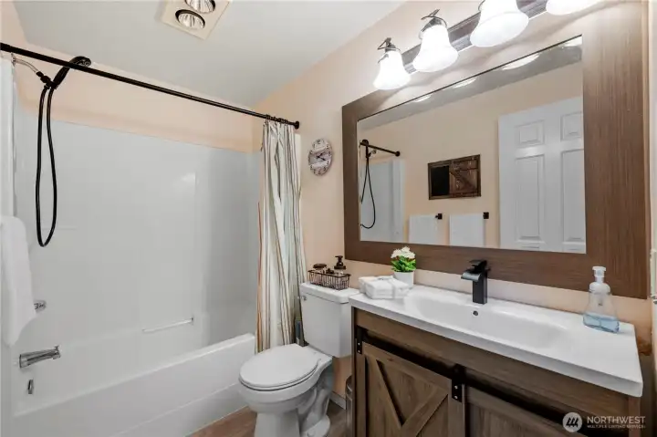 Guest bathroom, with updated vanity and flooring