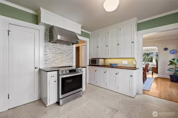 Pantry to the left of the stove.