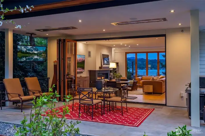 Built-in heaters, speakers and easy indoor/outdoor flow.