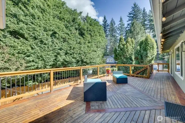 Spcaious deck with custom inlay design, and stairwell to the courtyard below. So much room to entertain on those Summer nights! Spcaious deck with custom inlay design, and stairwell to the courtyard below. So much room to entertain on those Summer nights!